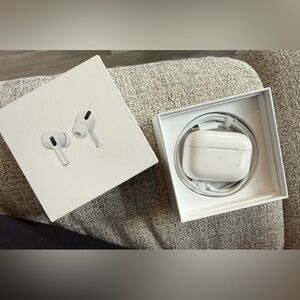 Apple White AirPods Pro with Lightning Cable in Box